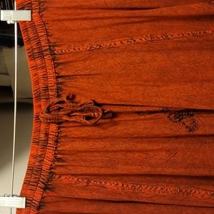 Hello I am selling a red hippie skirt good condition